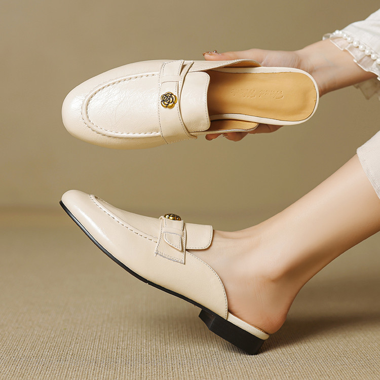 minimalist-leather-slippers-with-metal-accents-and-chunky-mid-heel Minimalist Leather Slippers with Metal Accents and Chunky Mid Heel